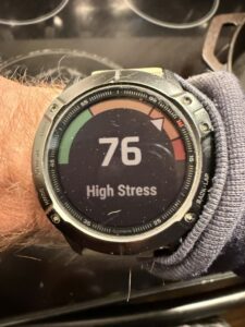 Garmin Edge screen displaying a custom HRV stress score used to measure physiological readiness in physiology-first cycling training.