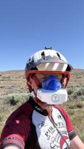 Cycling coach Richard Wharton performing an outdoor metabolic test with a VO2 Master analyzer mask on Peavine Mountain.